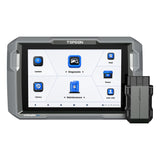 TOPDON ArtiDiag900 Lite diagnostic scanner with touchscreen display and external OBD2 connector module.