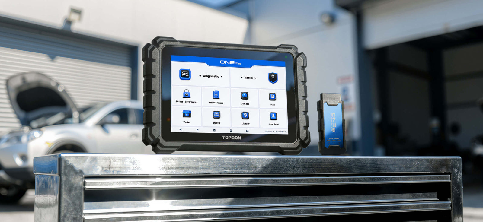TOPDON diagnostic tool connected to a vehicle