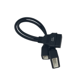 Black Nissan diagnostic connector with dual adapters and coiled cable.
